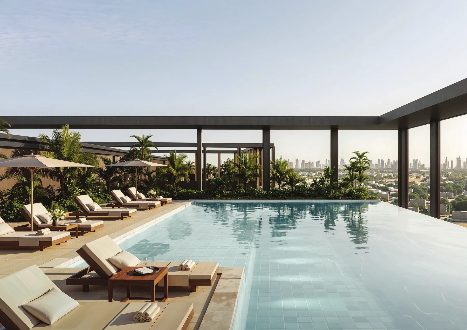 The rooftop pool with the Dubai skyline beyond